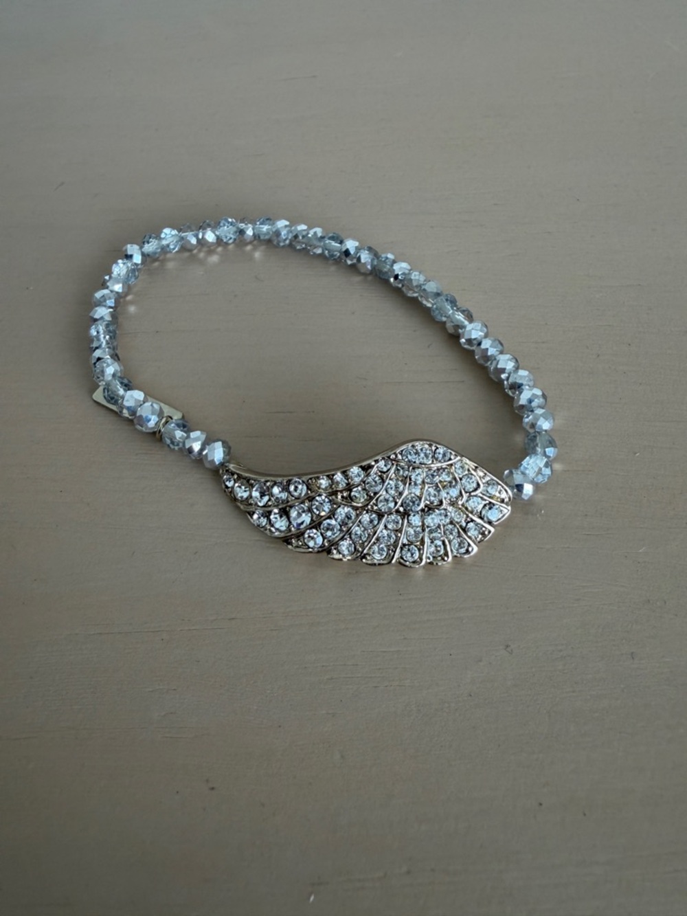 Vintage “Cookie Lee” Silver /gold tone Crystal like Wing Stretch Bracelet
